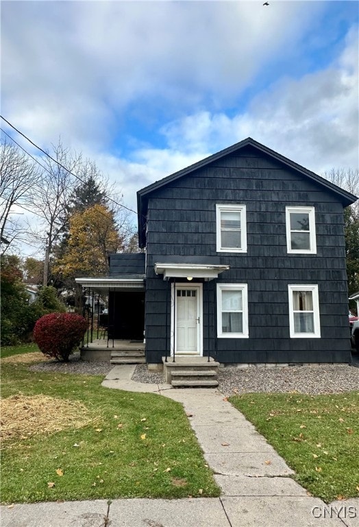 front of property featuring a front yard