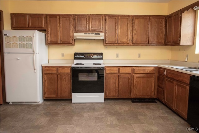 kitchen featuring white appliances and sink