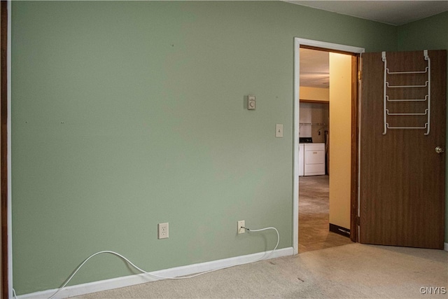 unfurnished room featuring carpet floors