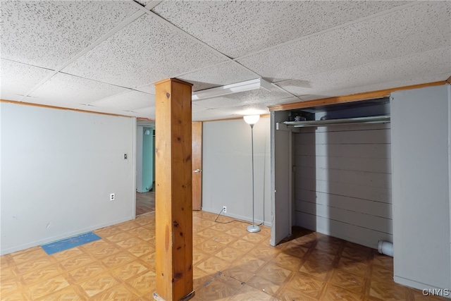 basement with a drop ceiling