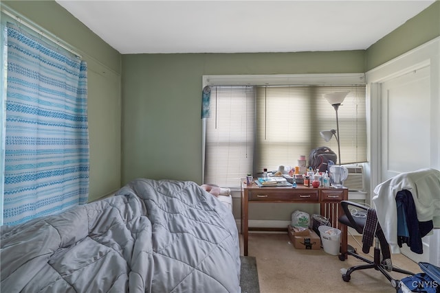 carpeted bedroom featuring cooling unit