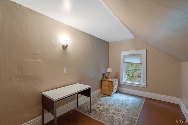 additional living space featuring lofted ceiling