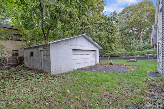 garage with a lawn