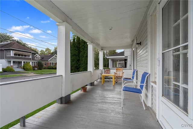 wooden deck featuring a porch