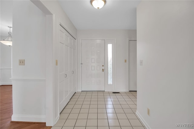 foyer entrance featuring light hardwood / wood-style flooring