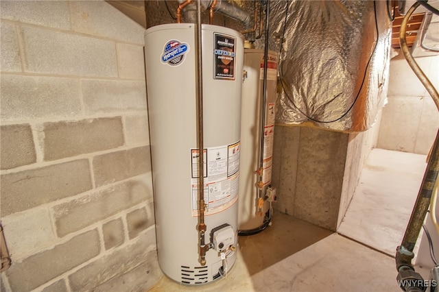 utility room featuring water heater