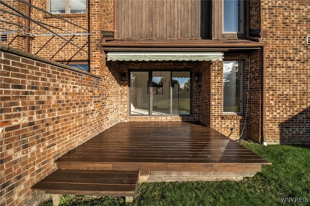 doorway to property with a wooden deck