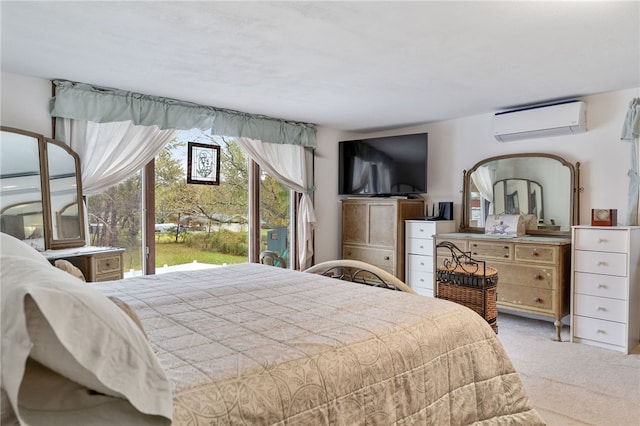 carpeted bedroom with a wall mounted AC