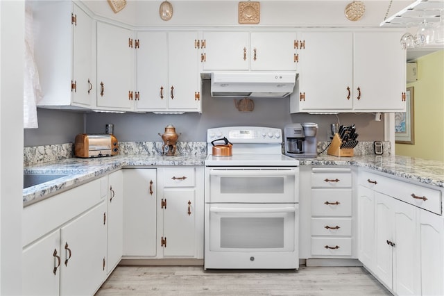 kitchen featuring white cabinets, light hardwood / wood-style flooring, white range with electric stovetop, and light stone countertops