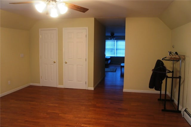 bonus room featuring a baseboard radiator, ceiling fan, vaulted ceiling, and dark hardwood / wood-style flooring