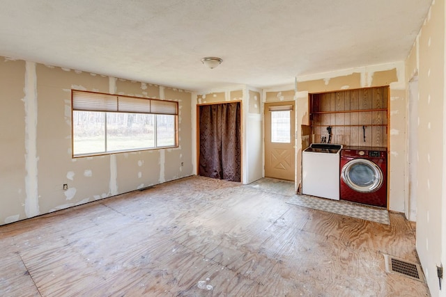 interior space featuring washing machine and dryer