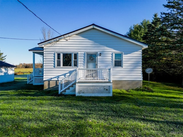 view of front of home with a front yard