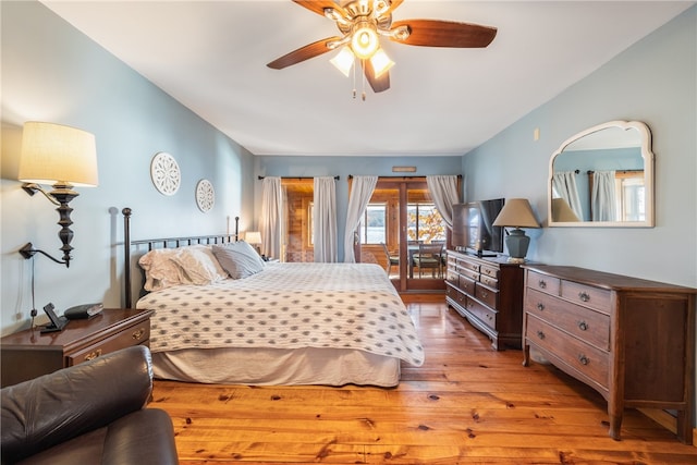 bedroom featuring light hardwood / wood-style flooring, access to outside, and ceiling fan