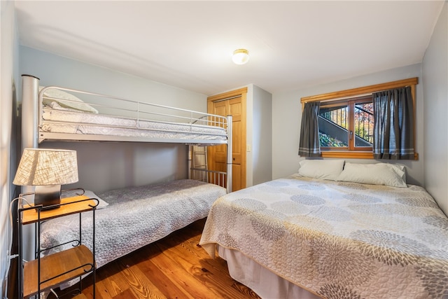 bedroom featuring a closet and hardwood / wood-style floors