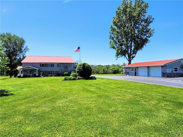 view of yard with a garage