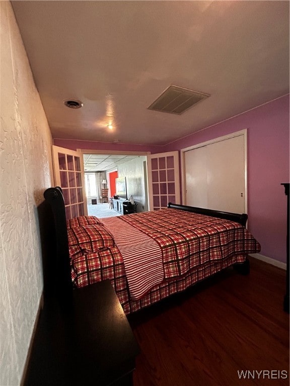 bedroom featuring hardwood / wood-style flooring