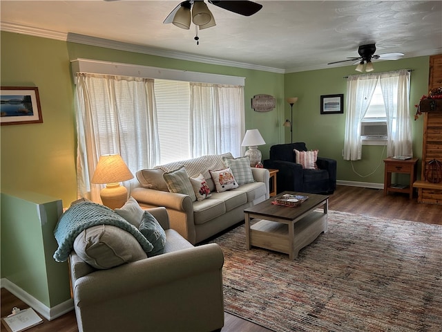 living room featuring crown molding, dark hardwood / wood-style floors, and ceiling fan