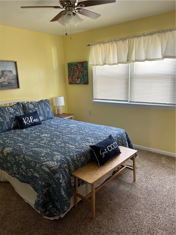 bedroom featuring carpet floors and ceiling fan