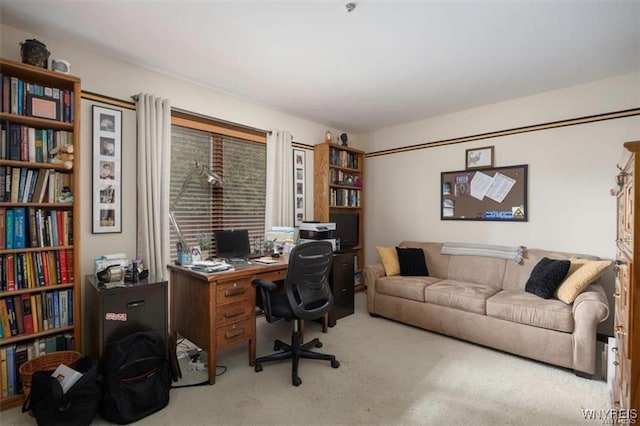 home office featuring light carpet