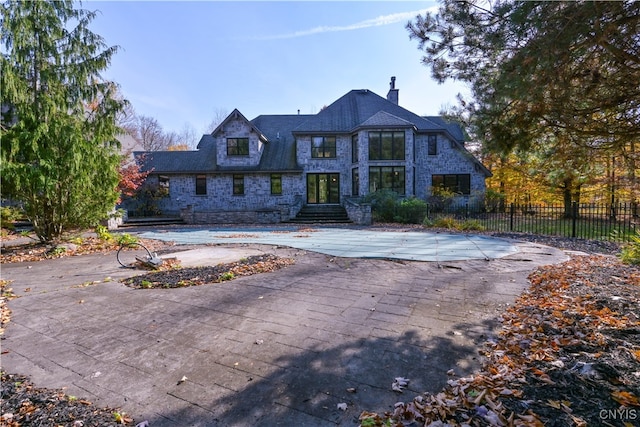 view of front of property with a patio area