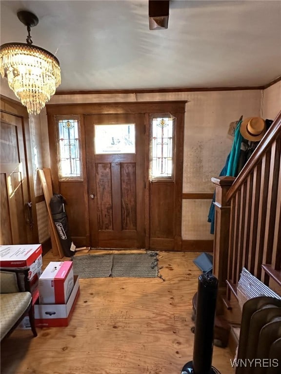 foyer with a notable chandelier