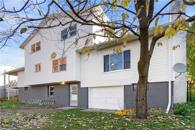 view of front of home featuring a garage