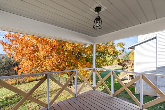 deck featuring a lawn