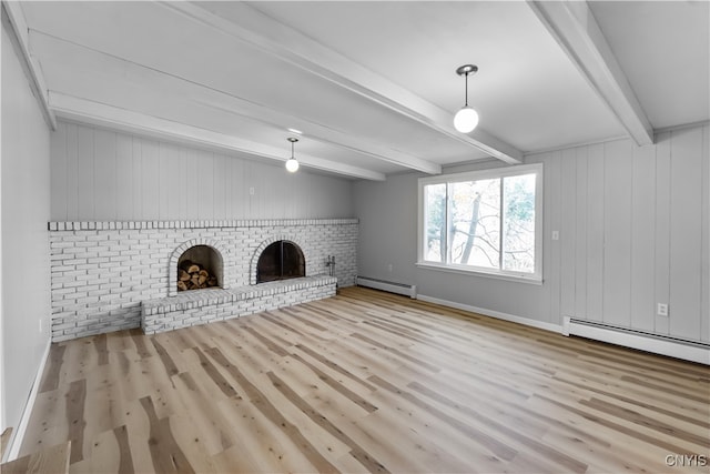 unfurnished living room with a baseboard heating unit, a fireplace, light hardwood / wood-style floors, and beamed ceiling