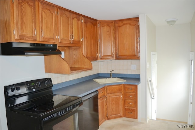 kitchen with decorative backsplash, dishwasher, sink, and black electric range oven