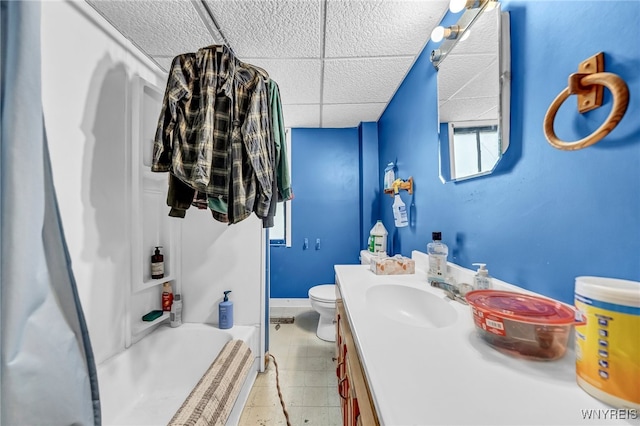 full bathroom featuring toilet, vanity, and shower / tub combo