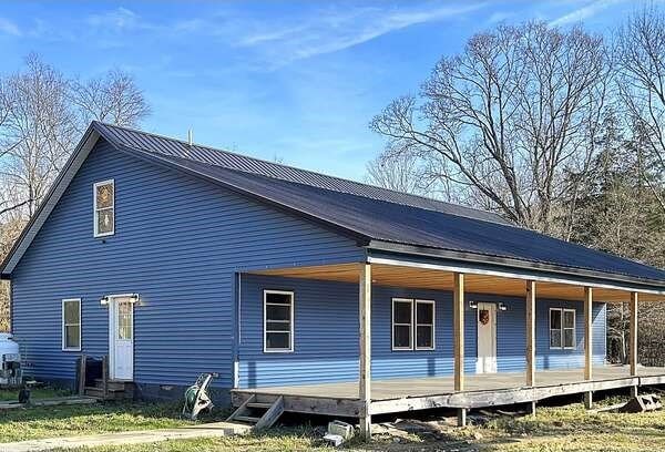 back of house with a porch