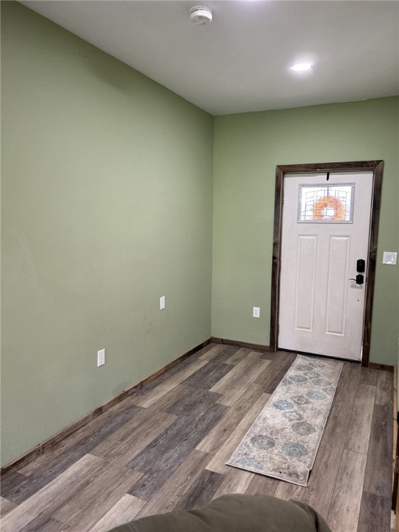 foyer entrance with hardwood / wood-style floors