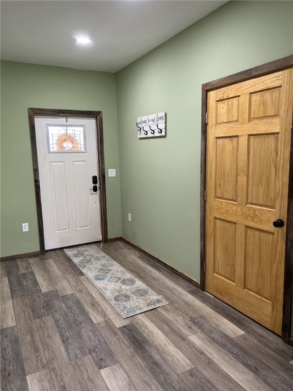 entrance foyer with dark hardwood / wood-style flooring