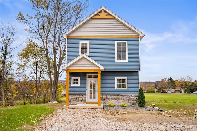 view of front of home with a front yard