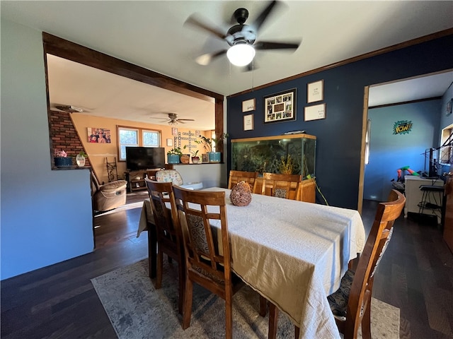 dining area featuring dark hardwood / wood-style flooring and ceiling fan