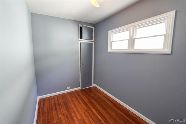 spare room with hardwood / wood-style flooring