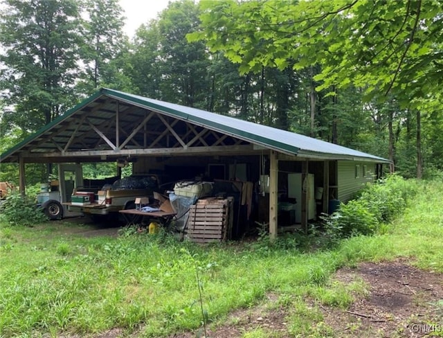 view of parking featuring a carport