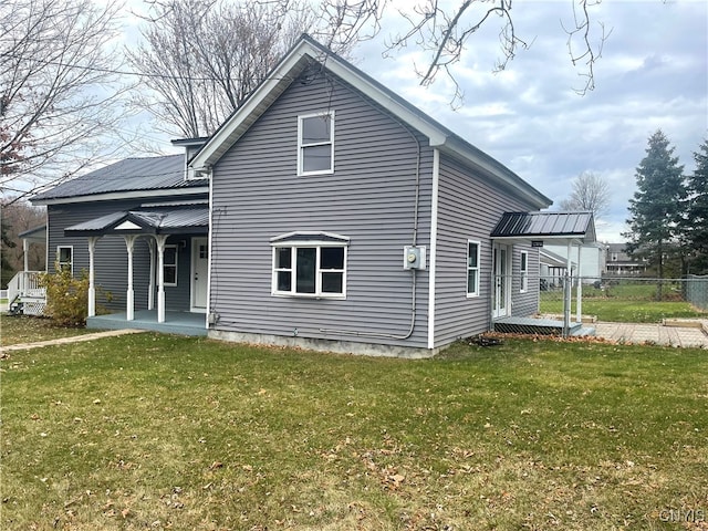 exterior space featuring a front lawn