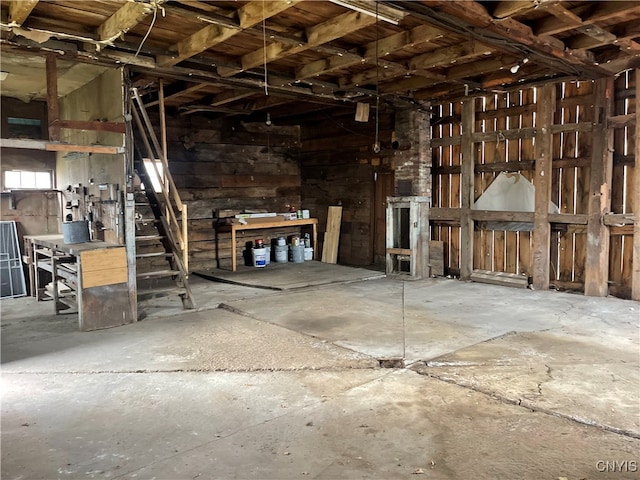 misc room with concrete flooring