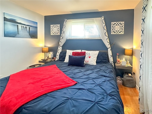 bedroom featuring hardwood / wood-style flooring