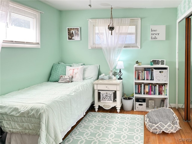 bedroom featuring hardwood / wood-style floors