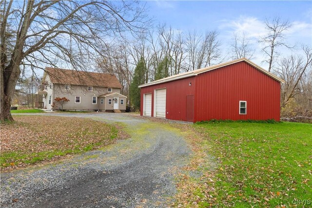 view of outdoor structure with a yard