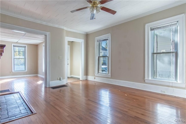 spare room with ceiling fan, light hardwood / wood-style flooring, and ornamental molding