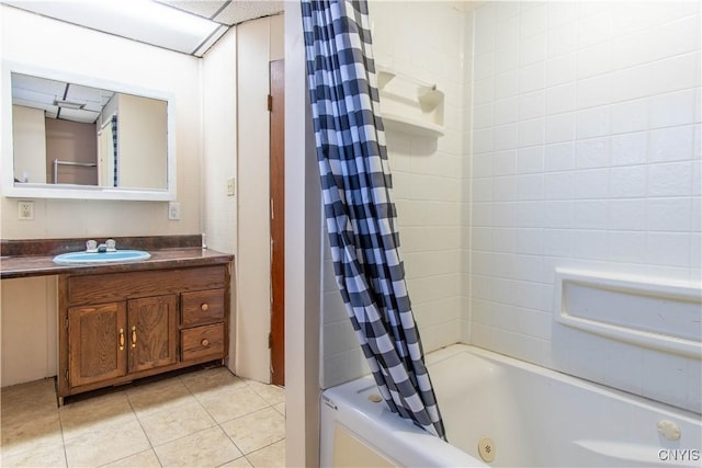 bathroom with tile patterned floors, vanity, and shower / bathtub combination with curtain