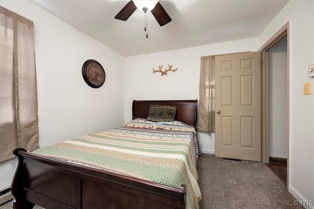 bedroom with ceiling fan and carpet floors