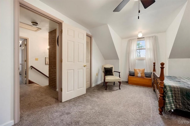 carpeted bedroom with ceiling fan and lofted ceiling