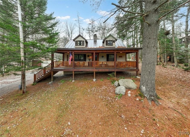 view of front of home featuring covered porch