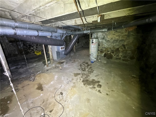 basement featuring gas water heater