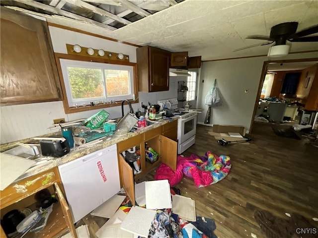 353 S James St, Wilna, NY 13619 - kitchen with white electric range oven, ceiling fan, light countertops, under cabinet range hood, and light wood finished floors