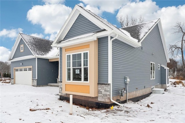 view of snow covered property